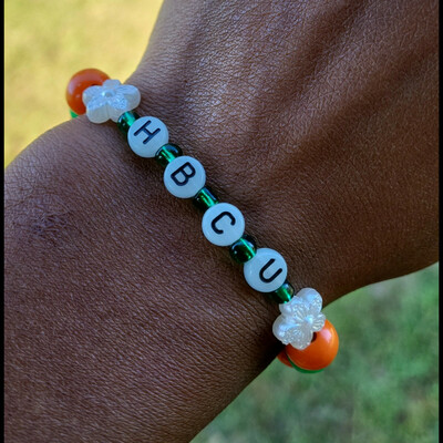 HBCU 🧡💚🐍 GLOW IN THE DARK ALPHABET BRACELET🐍🐍🧡💚 READY-MADE🎨⏳️ By Nubian Collection Artwear 👑