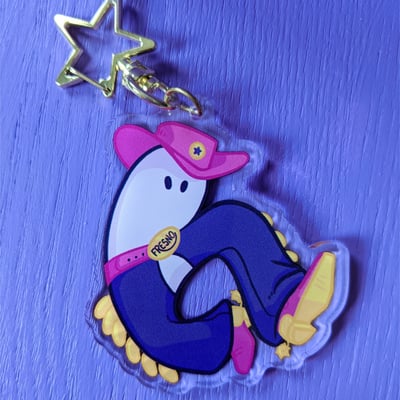Cowboy cryptid charms
