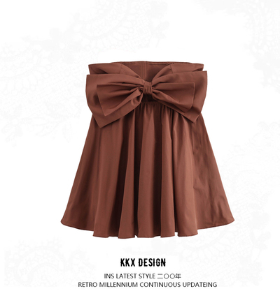 Fashionable bow-decorated open-cut dress