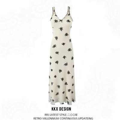 Deep v-neck ruffled suspender dress
