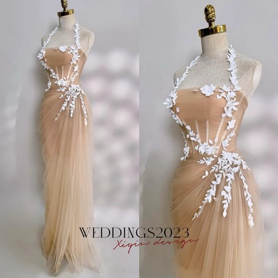 Champagne dusty pink wedding dress with airy tulle skirt and white lace appliqué
