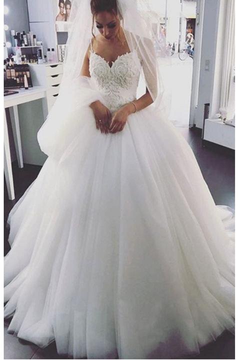 white lace ball gown wedding dress